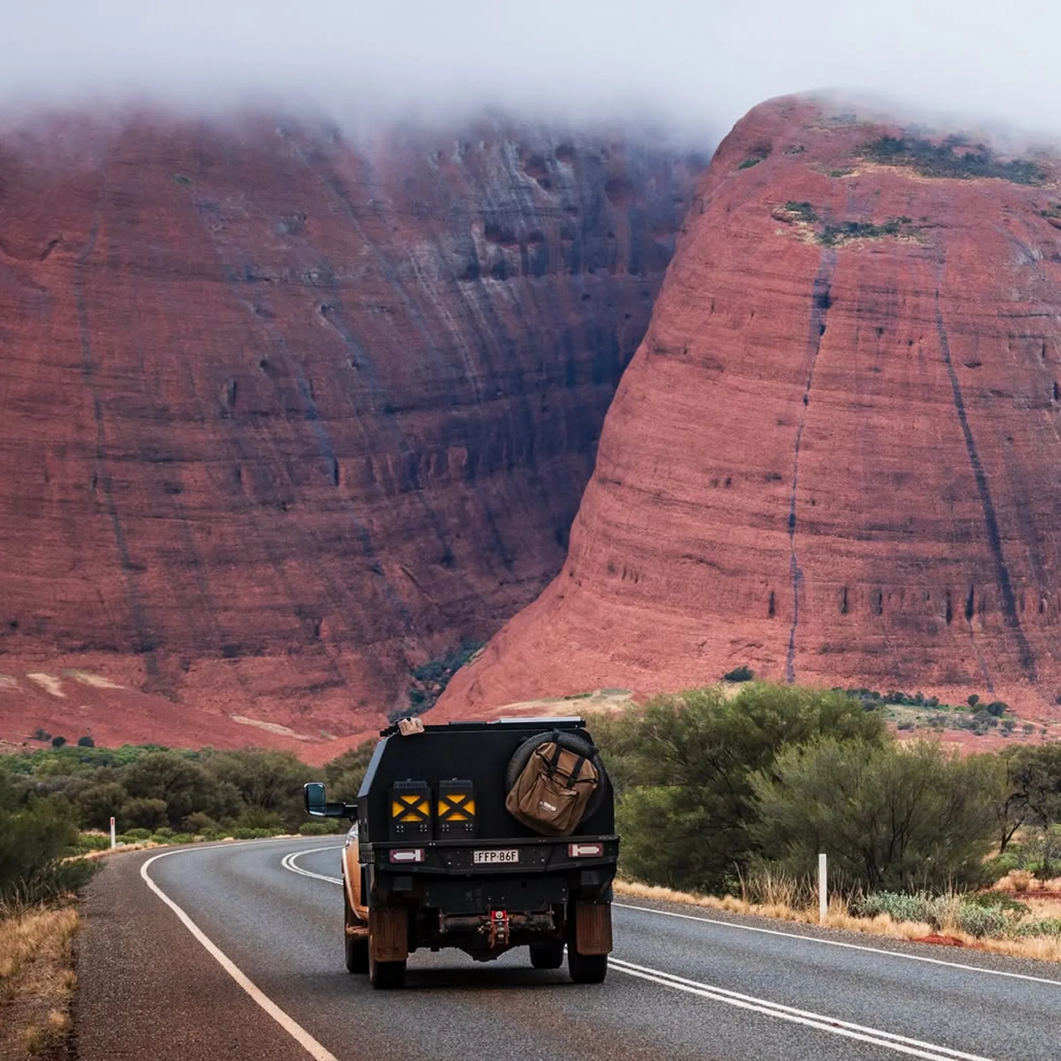 uluru campsite with tent and campfire